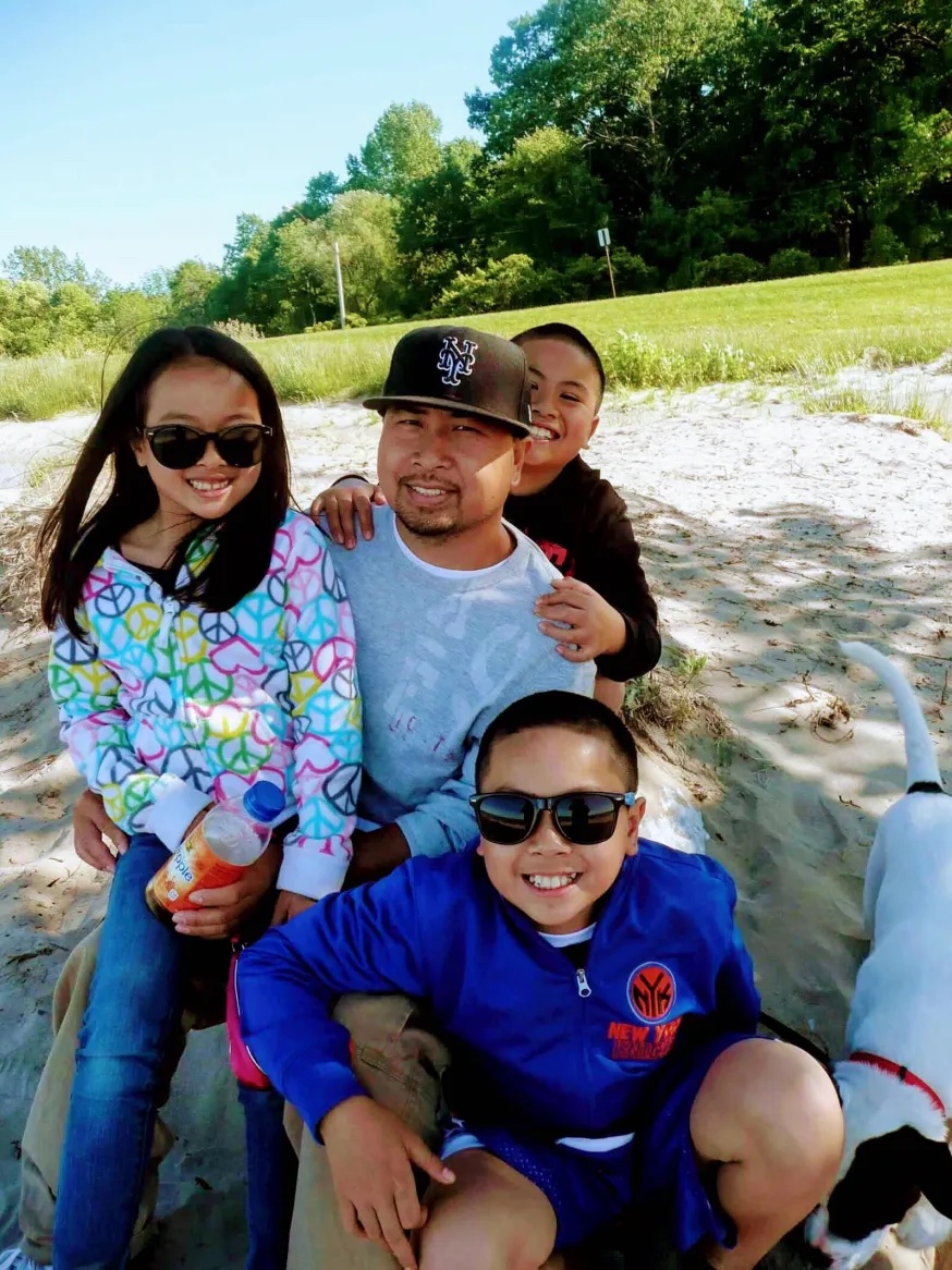 Dominick with family at the beach